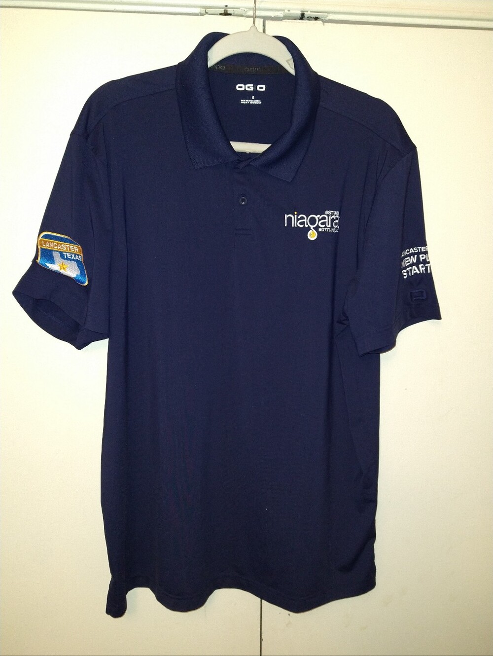 Ogio Niagara Bottling Blue Employee Uniform Polo Shirt Men's sz Large.